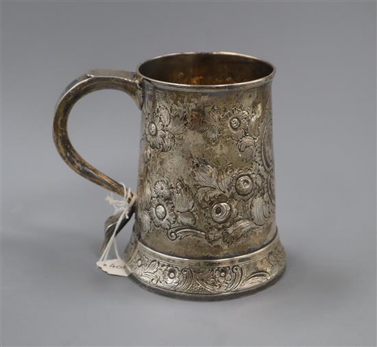 A George III later embossed silver mug, Charles Hougham, London, 1790, 9 oz.